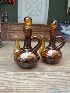 Set of two hand blown amber glass mini pitchers /apothecary jars